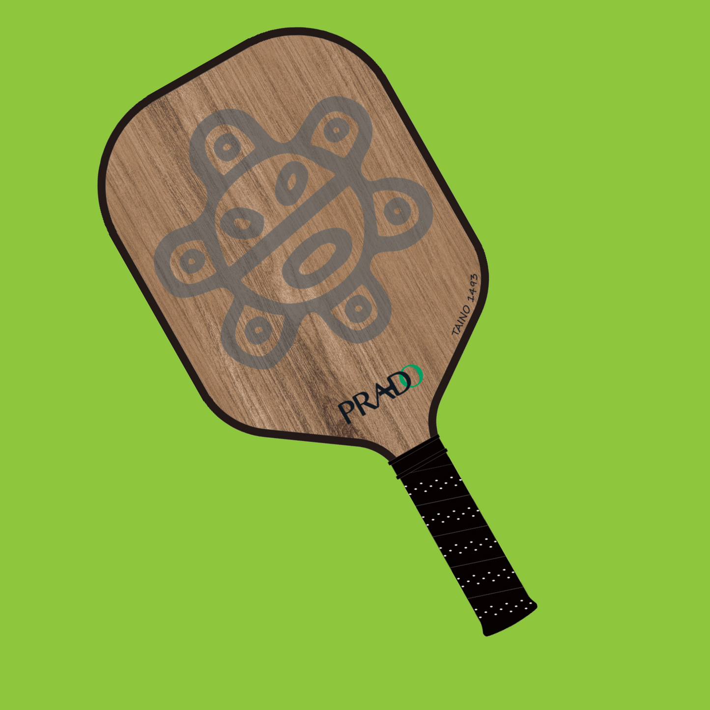 Taino Sun Paddle wooden pickleball paddle with Puerto Rican Taino sun design and black grip on green background