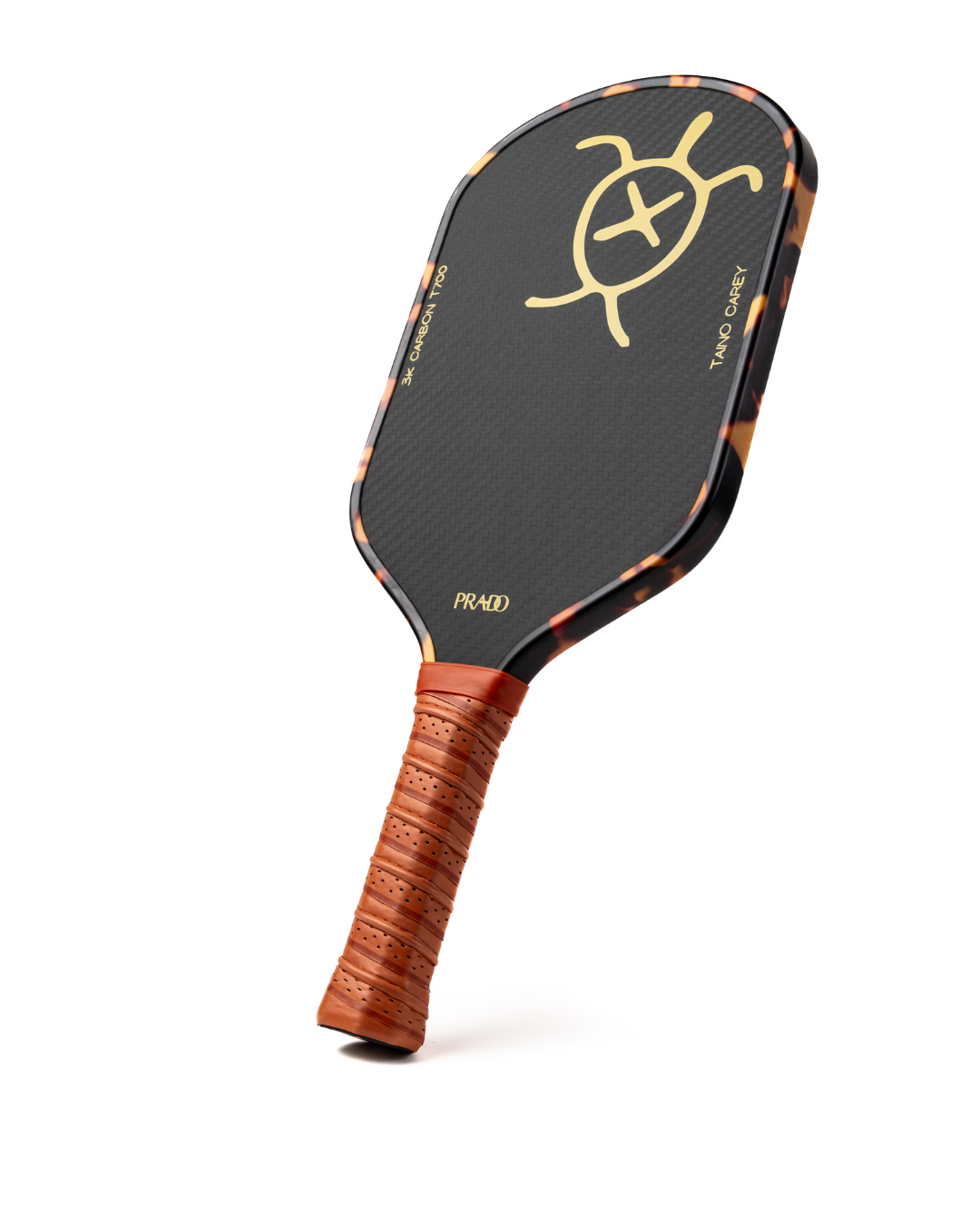 Taíno Carey Paddle with 3K T700 carbon fiber face and 14mm honeycomb core, tortoiseshell edge guard, elongated brown PU leather handle