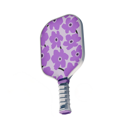 Customizable thermoformed carbon fiber pickleball paddle with purple floral design and ergonomic grip for pro-level performance