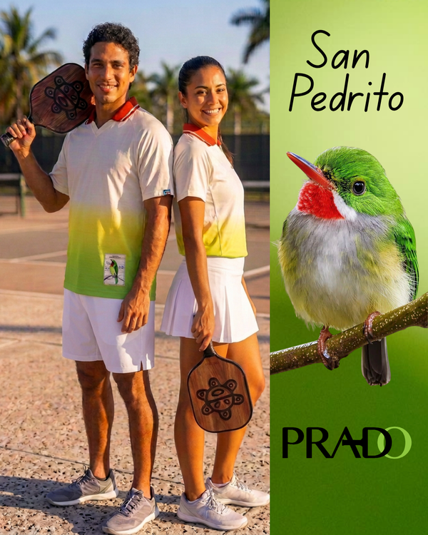 A split promotional image showing two people wearing matching white and yellow gradient athletic shirts and shorts on a court, alongside a green panel with the text 'San Pedrito' and 'PRADO' and a green bird on a branch.