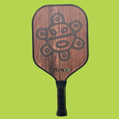 Taino Sun Paddle premium T700 carbon fiber pickleball paddle with Puerto Rican heritage sun design and ergonomic grip