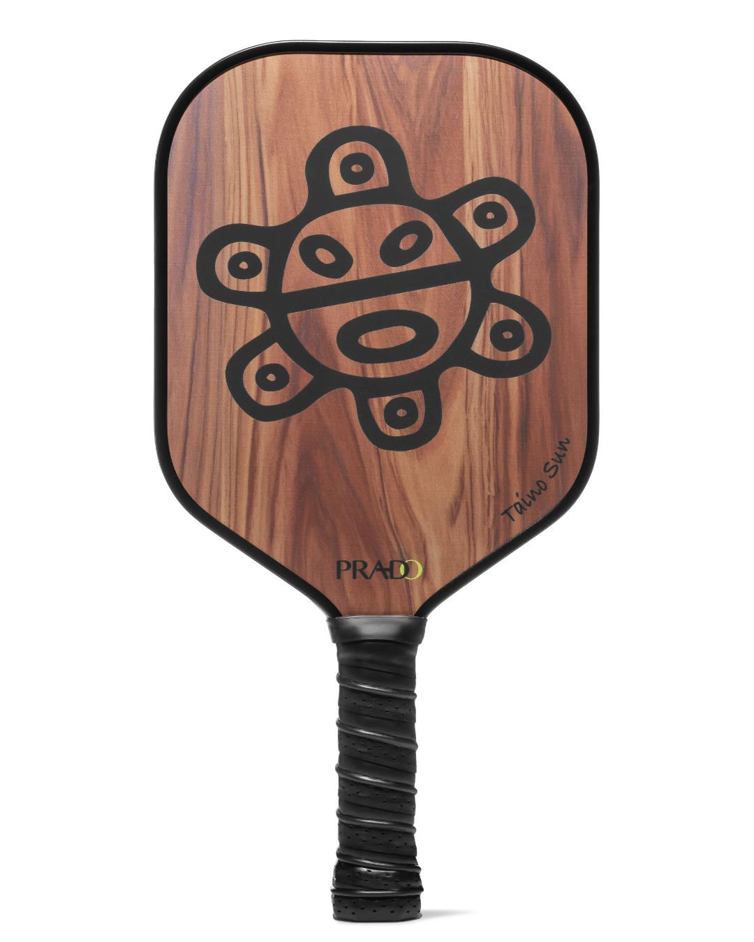  Front view of the Prado Taíno Sun 16mm control pickleball paddle with wood-grain carbon fiber face, black Taíno sun petroglyph, Prado logo, and black spiral grip