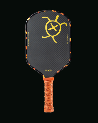 Taíno Carey Paddle with carbon fiber face and tortoiseshell edge guard for precision and spin