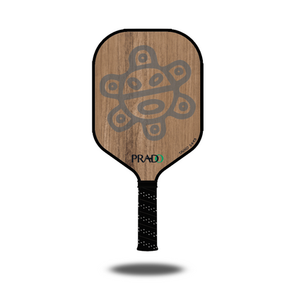 Taino Sun Paddle with Puerto Rican cultural design, T700 carbon fiber, textured surface, and black grip handle.